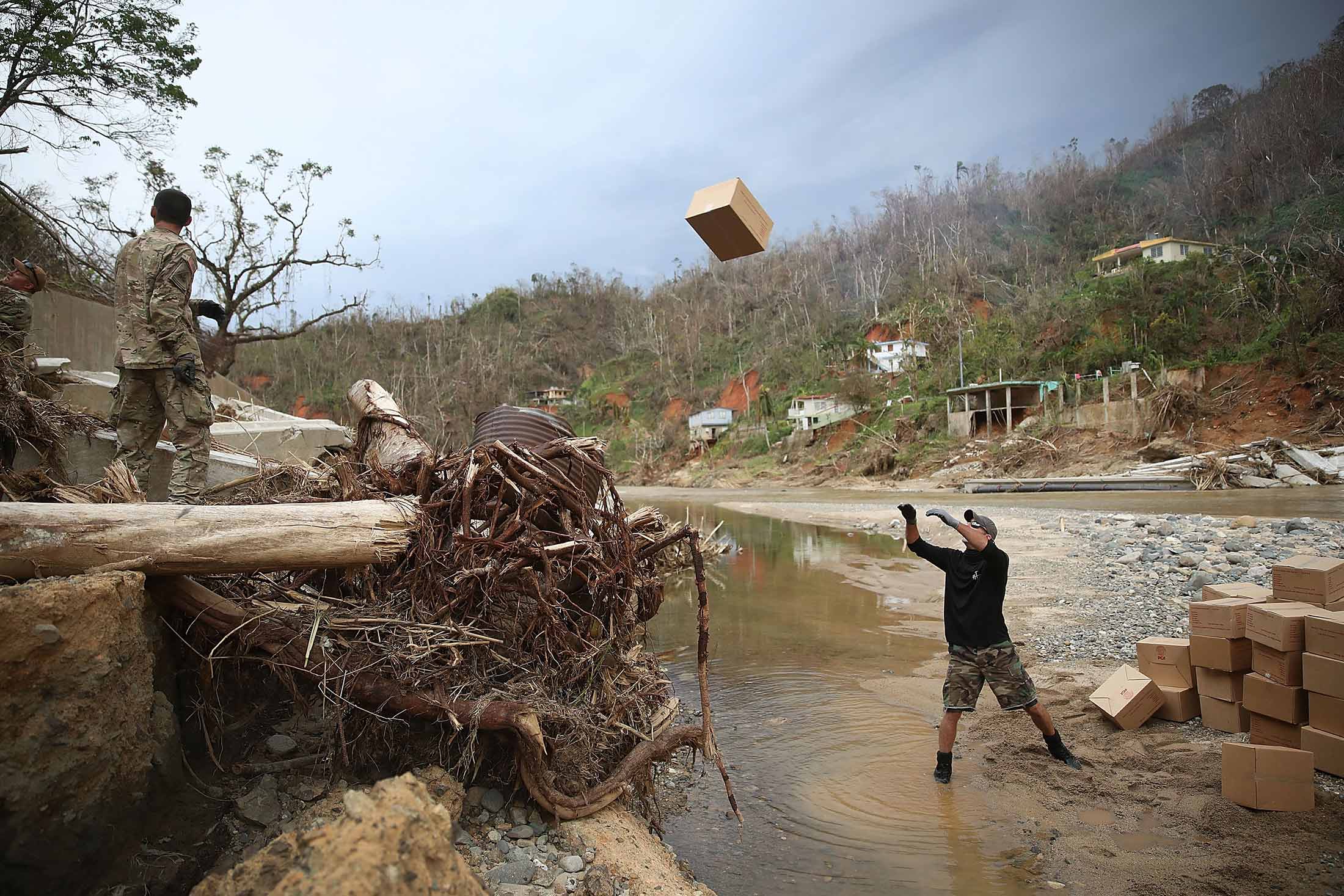 Soldiers from the U.S. Army’s 1st Special Forces Command organize food and water deliveries for residents of Utuado, Puerto Rico,&nbsp;on Oct 5.
