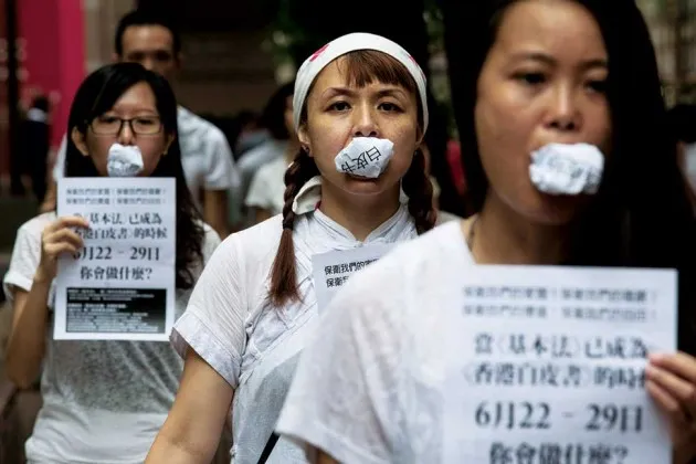 Pro-democracy activists in Hong Kong protesting Beijing’s attempts to silence them