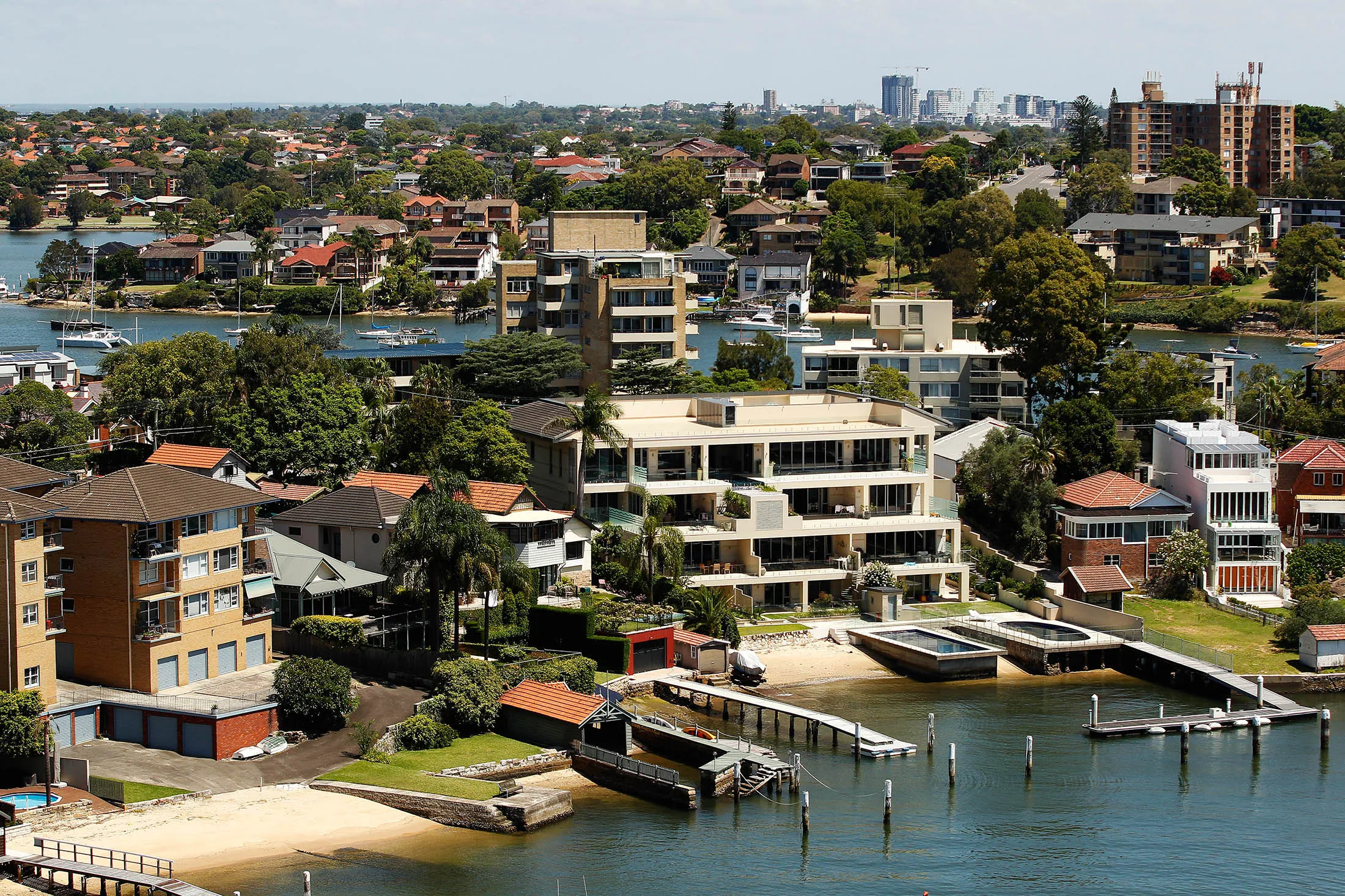 Houses stand in Sydney, Australia, on Wednesday, Feb. 17, 2016. Australia's opposition Labor Party is proposing scaling back tax breaks for landlords that have helped fuel a 50 percent increase in property prices in capital cities since 2008.
