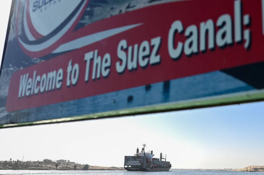 A ship transits the Suez Canal towards the Red Sea.