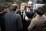 Robert Redford, center, stars in the 1972 film “The Candidate”