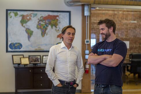 Ryan Petersen, CEO and founder of Flexport, right, speaks with Sanne Manders, COO, at the company's office in San Francisco.