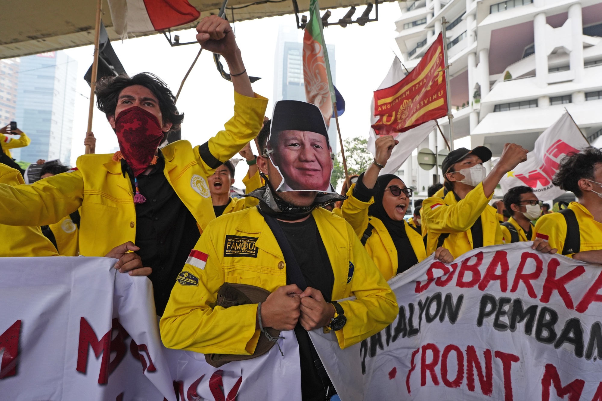 A demonstrator wears a mask depicting Indonesia's President Prabowo Subianto during an anti-government protest in Jakarta, Indonesia, on Friday, June 12, 2026. Students gathered in the capital, angry at the rising cost of living and calling on President Prabowo Subianto to rein in big-ticket spending. Photographer: Dimas Ardian/Bloomberg