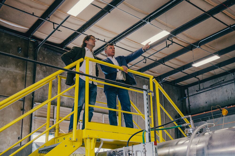 Group14 Technologies technology chief Rick Costantino, left, and CEO Rick Luebbe inside of the company’s commercial-scale Battery Active Materials manufacturing factory in Woodinville, Washington