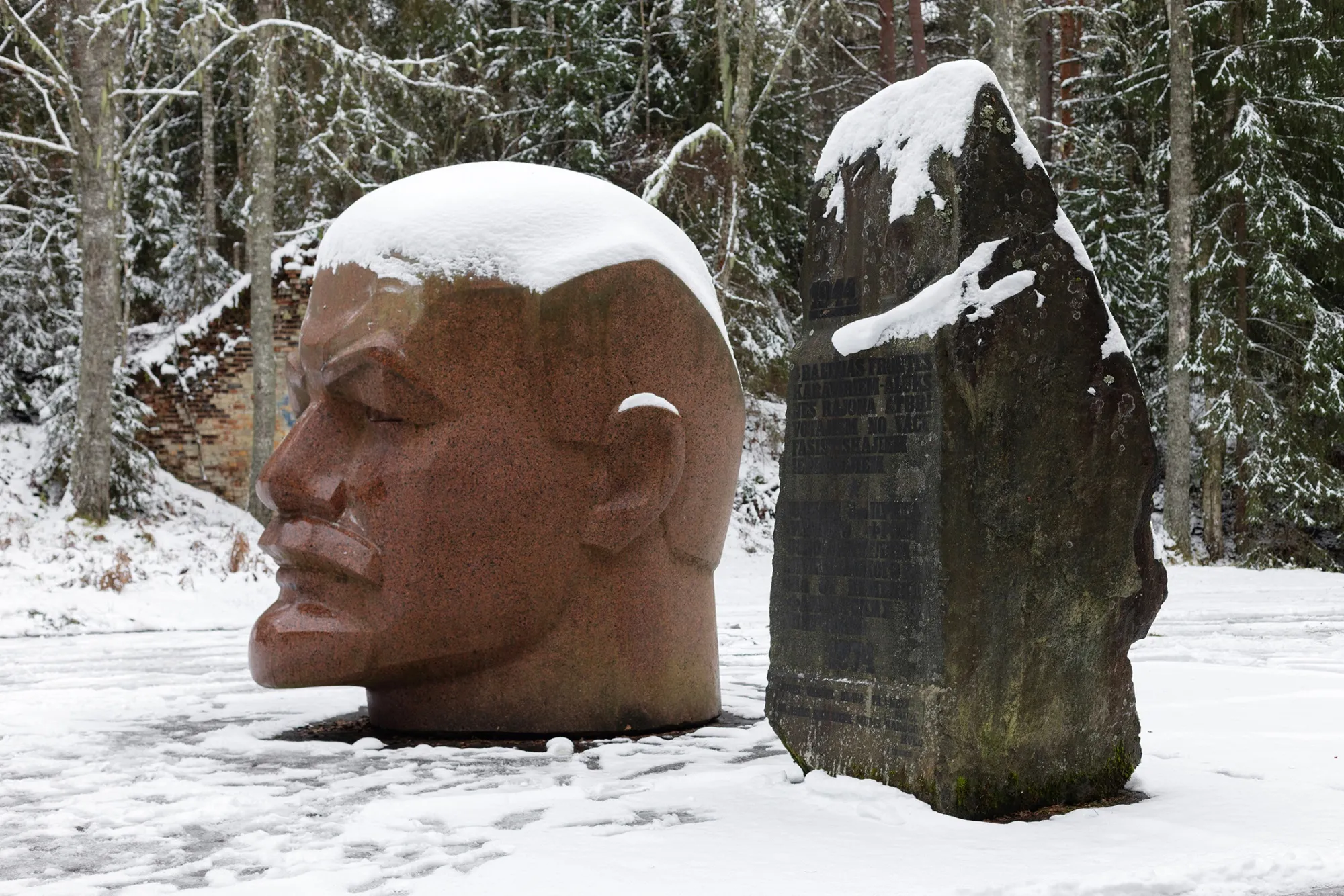 A bust of Lenin and a Red Army monument in Zeltiņi