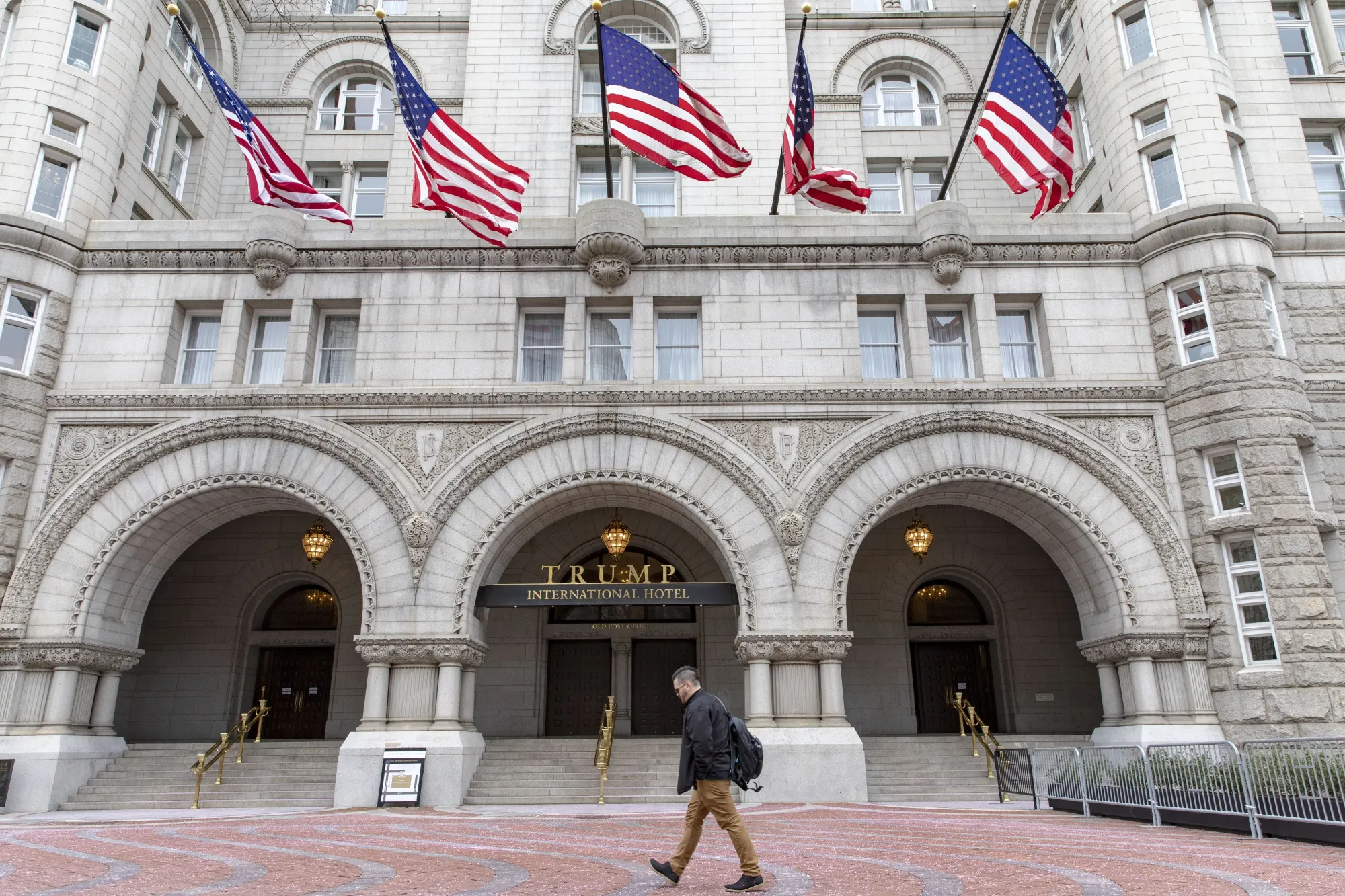A pedestrian walks past the Trump International Hotel in Washington on Jan. 12, 2019.