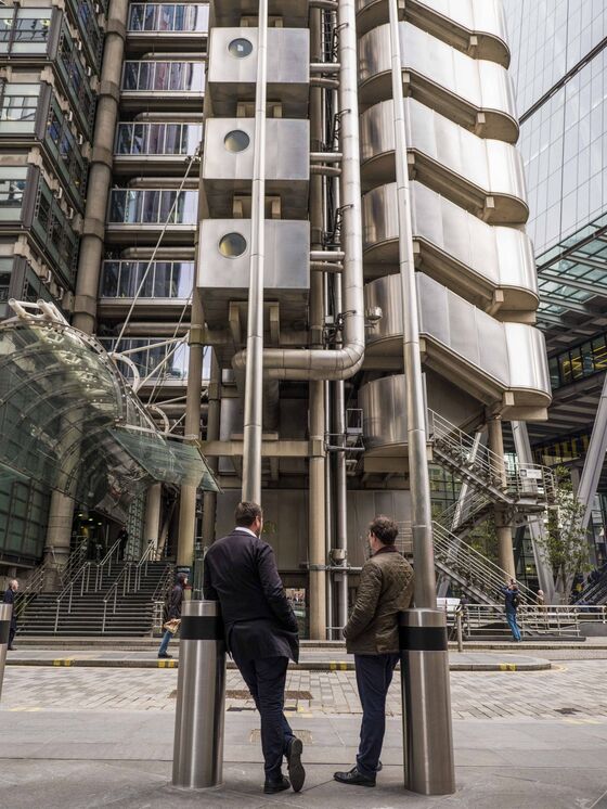 Workers Return to Weirder Offices With Moveable Walls and Touchless Elevators
