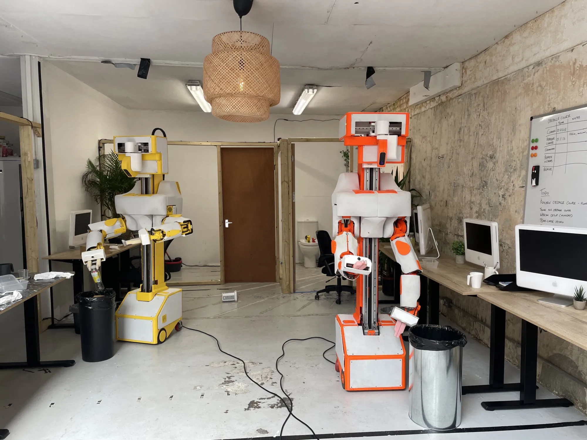 Alfie (right) at Prosper Robotics’ London office.