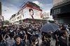 Protesters march through the streets of Sheung Shui.