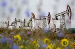 Oil pumping jacks in an oilfield near Almetyevsk, Russia.