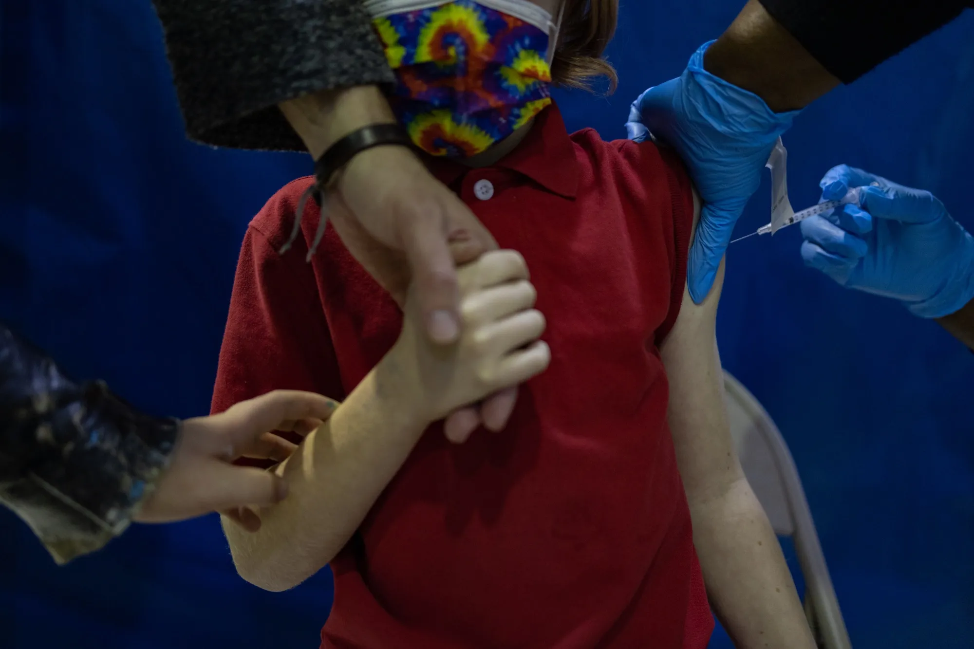 A healthcare worker administers a dose of the&nbsp;Covid-19 vaccine to a child&nbsp;in Philadelphia, Pennsylvania.