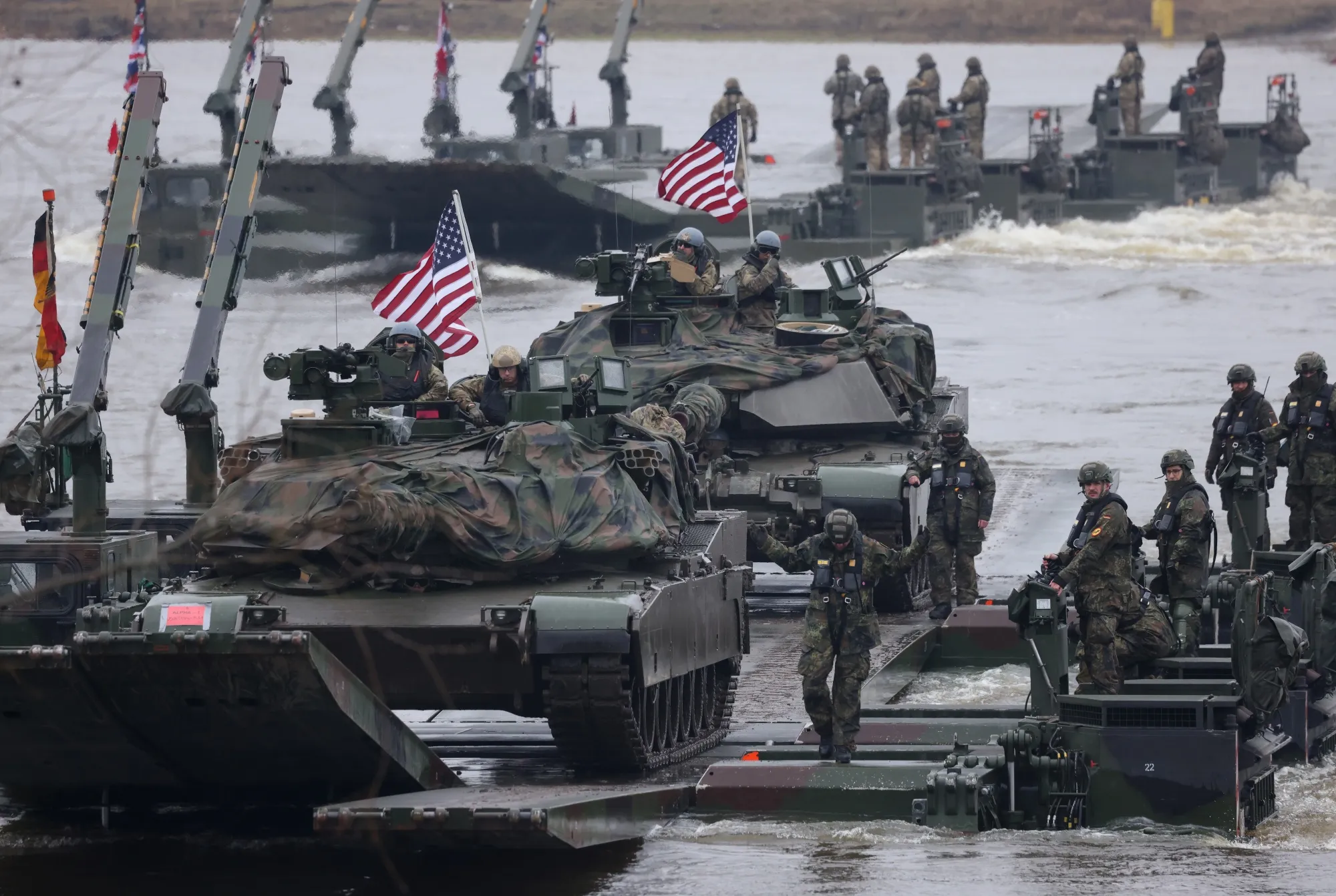 US Army&nbsp;tanks cross the Vistula River during a NATO military exercise near Gniew, Poland.&nbsp;