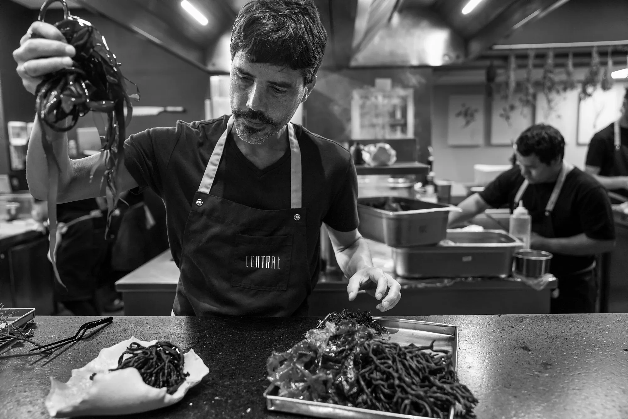 Virgilio Martínez prepares food in the kitchen at Central.