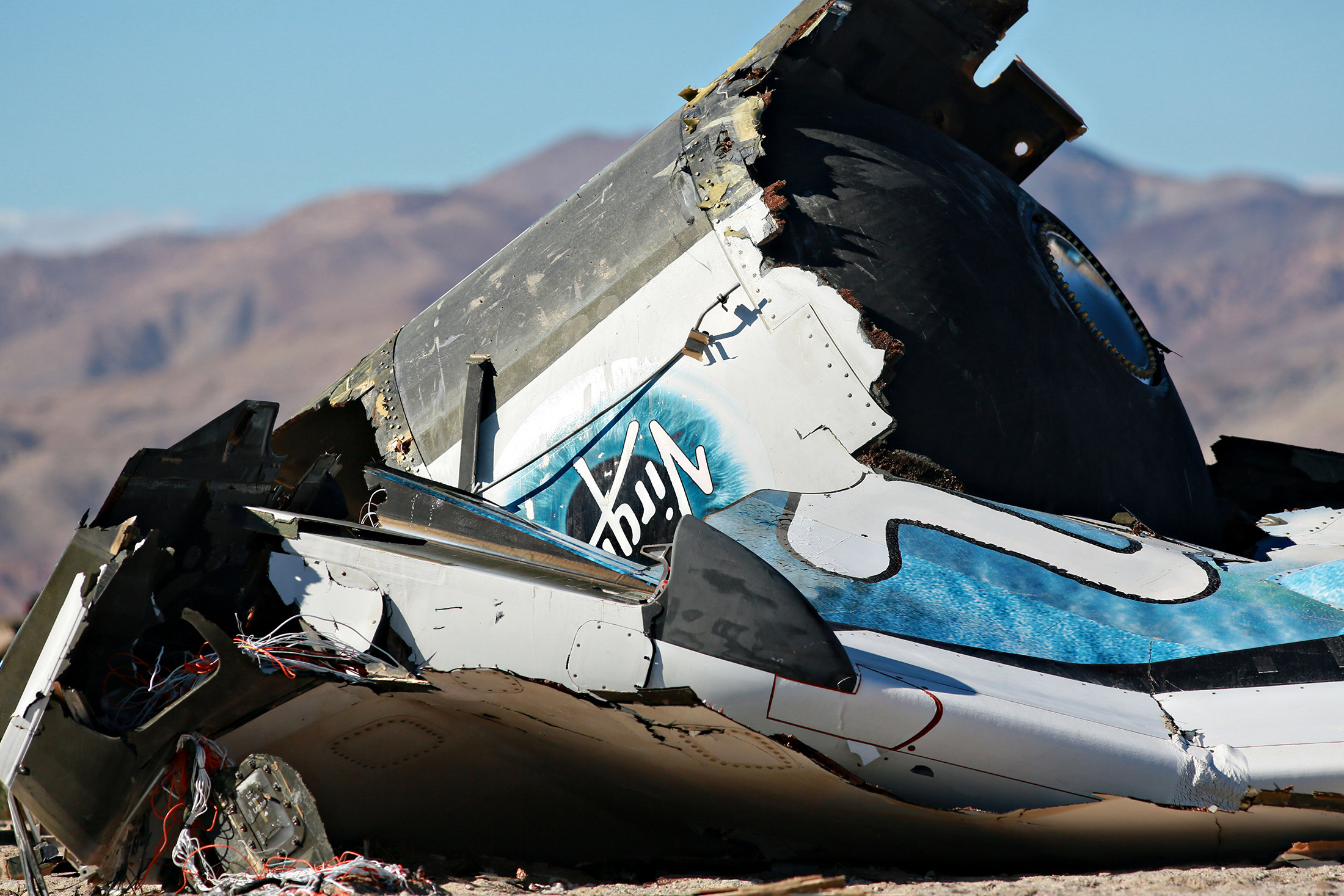 Debris from Virgin Galactic SpaceShip 2 sits in a desert field Nov. 2, 2014 north of Mojave, Calif. The Virgin Galactic SpaceShip 2 crashed on Oct. 31, 2014 during a test flight, killing one pilot and seriously injuring another
