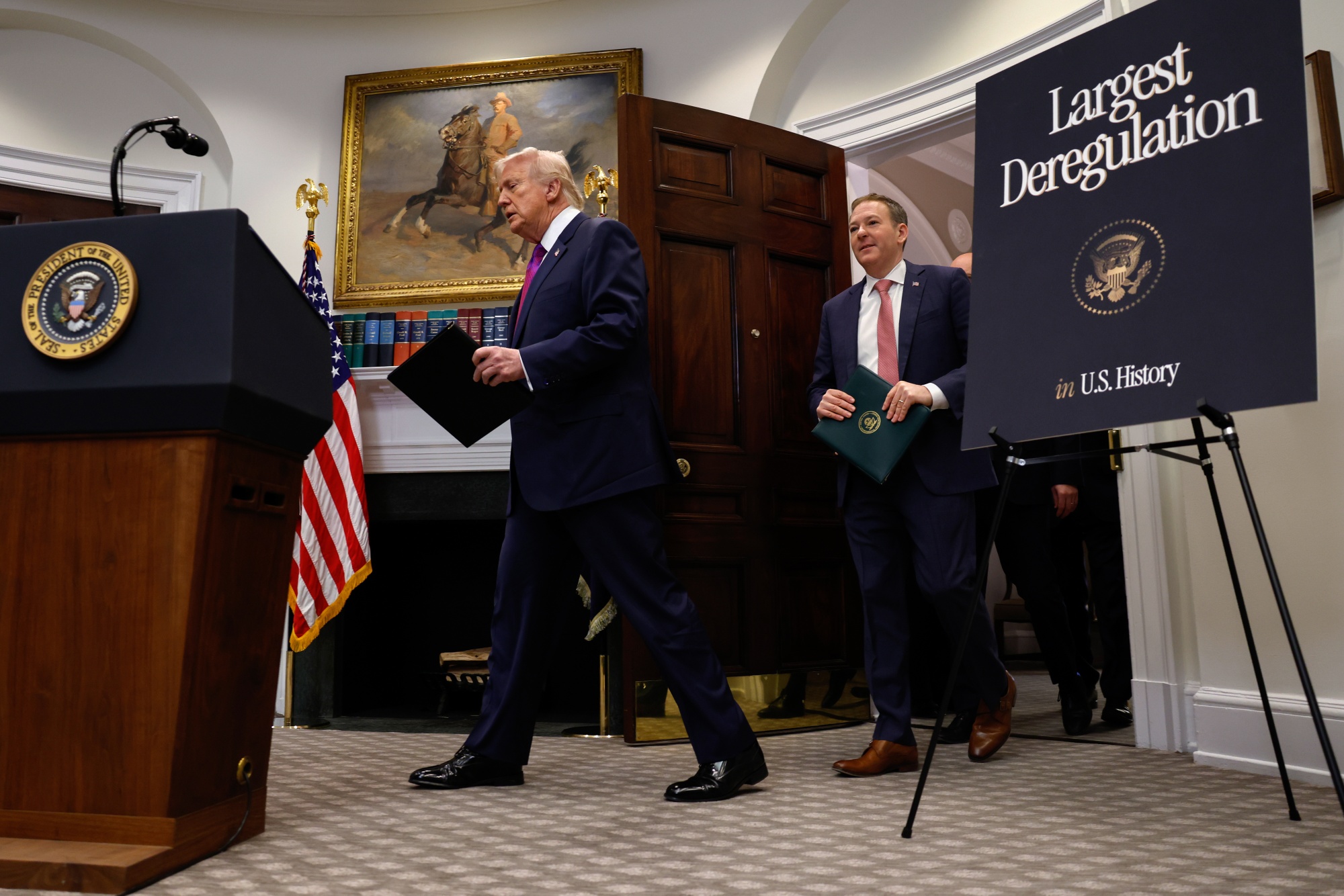 US President Donald Trump, left, and Lee Zeldin, administrator of the US Environmental Protection Agency, at the White House on Feb. 12, 2026, to announce the rescinding of the endangerment finding, a landmark scientific determination that greenhouse gases are harmful to human health. 