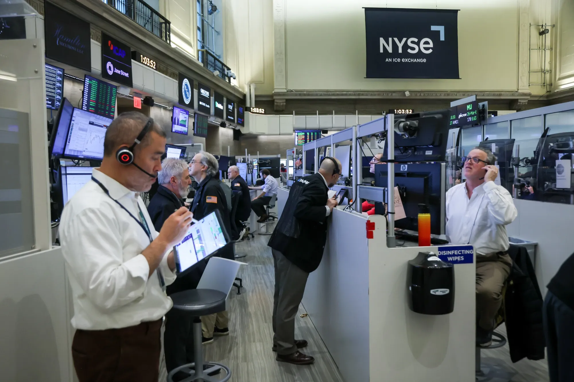 Traders work on the floor of the New York Stock Exchange.
