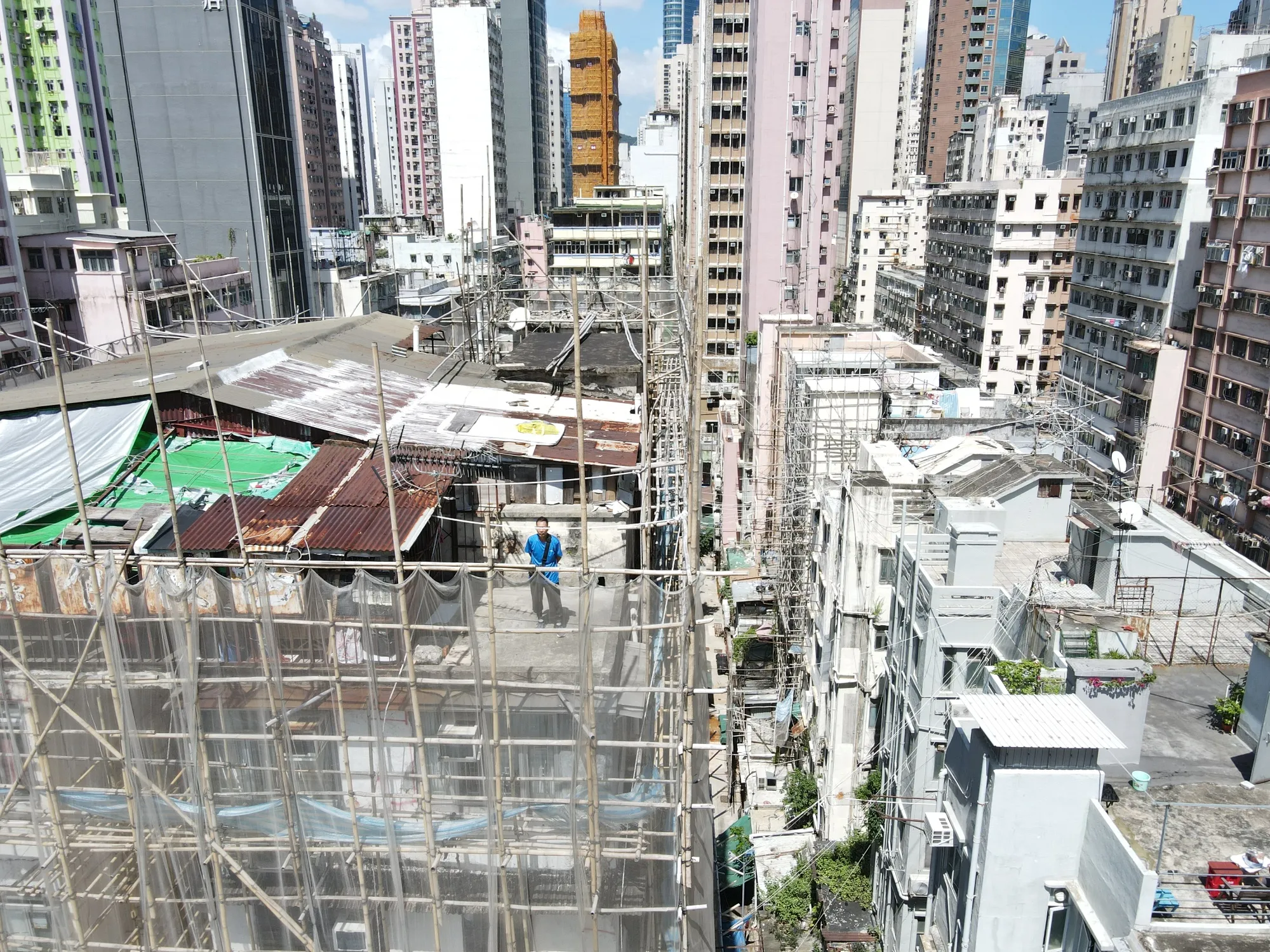 Hong Kong's Poorest Face a Combined Housing and Climate Crisis - Bloomberg