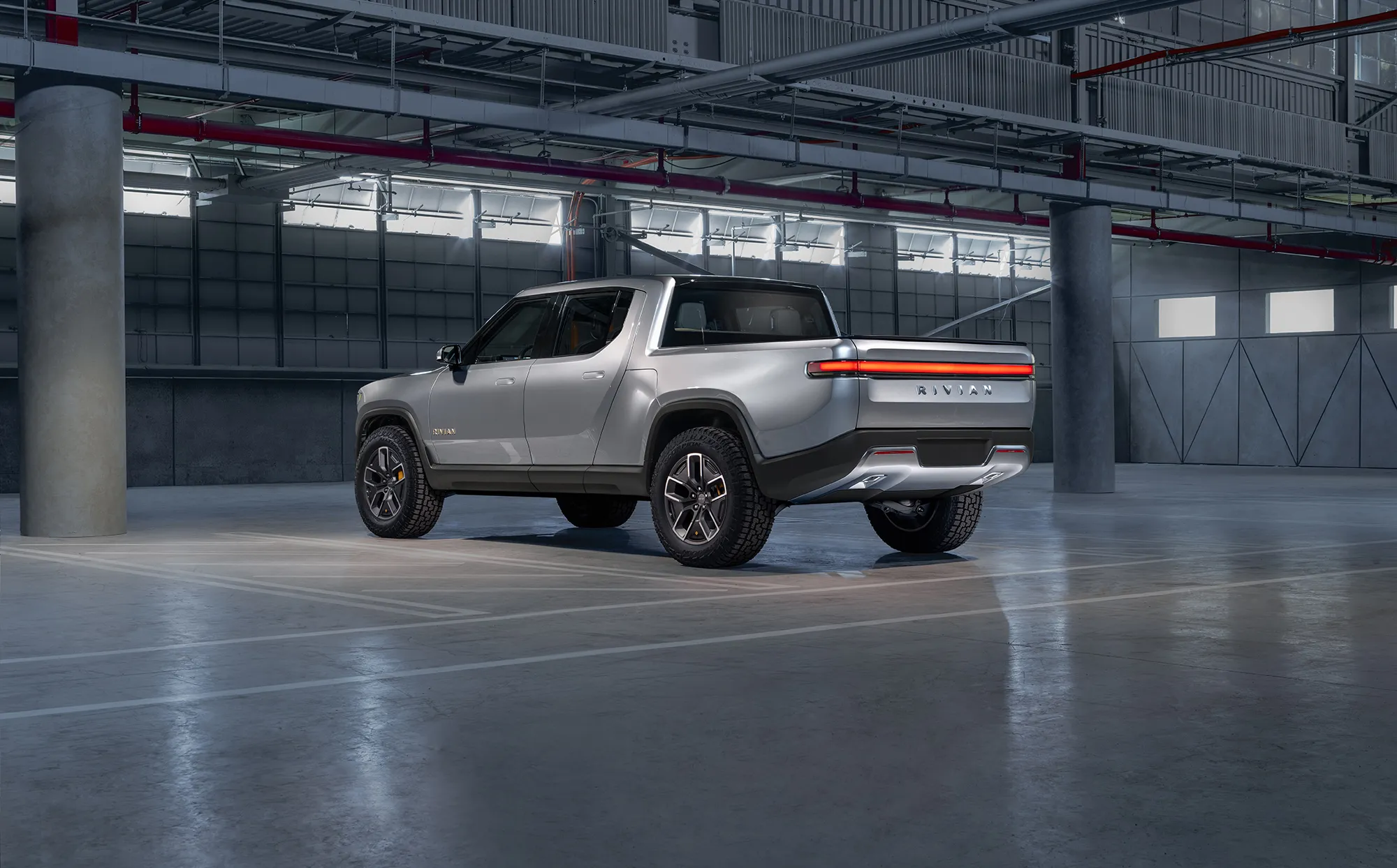 Amazon Backed Rivian Delays Production of Electric Pickup Truck to September Bloomberg