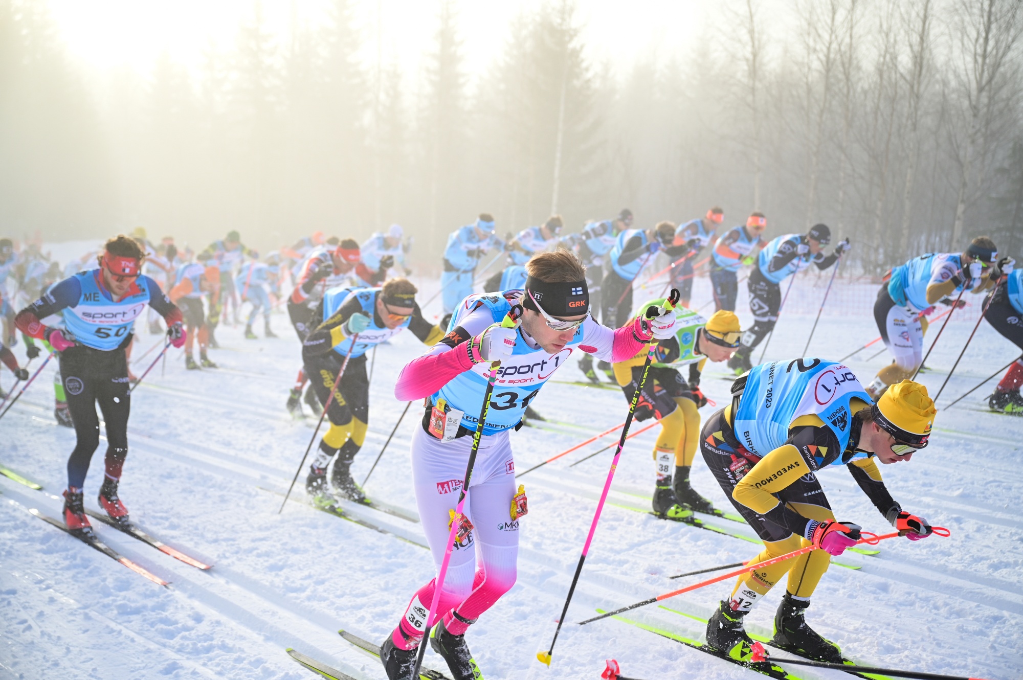 Viktor Maeenpaeae of Finland, Herman Paus of Norway competing during the Ski Classics Birkebeinerrennet Rena on March 18, 2023 in Rena, Norway.