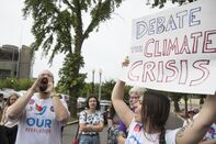 Greenpeace Protests Outside DNC Headquarters Urging The Party To Hold A Climate Change Debate