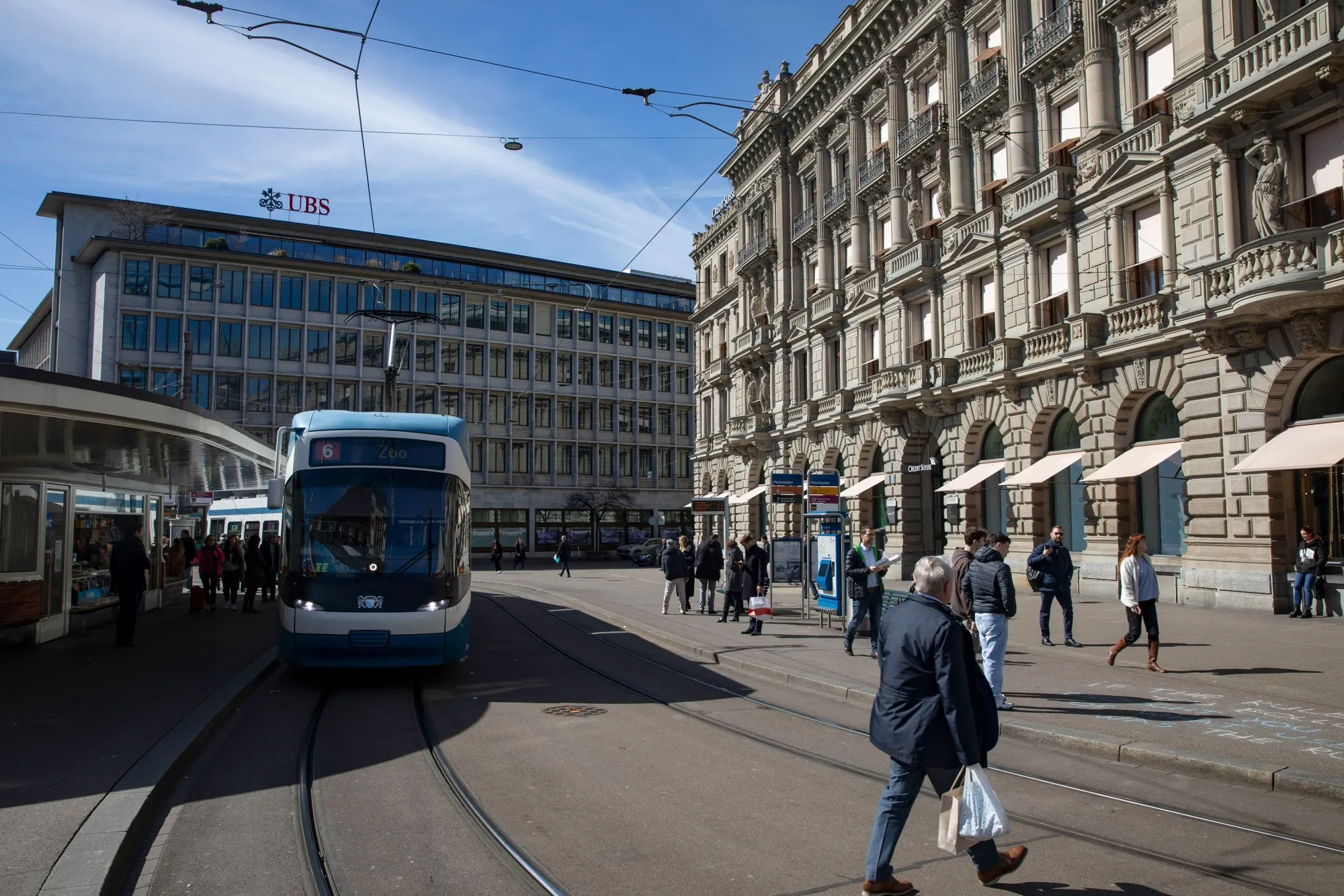 UBS offices next to Credit Suisse’s&nbsp;headquarters in Zurich. Regulators and senior officials at the banks are working through the weekend to strike a deal.