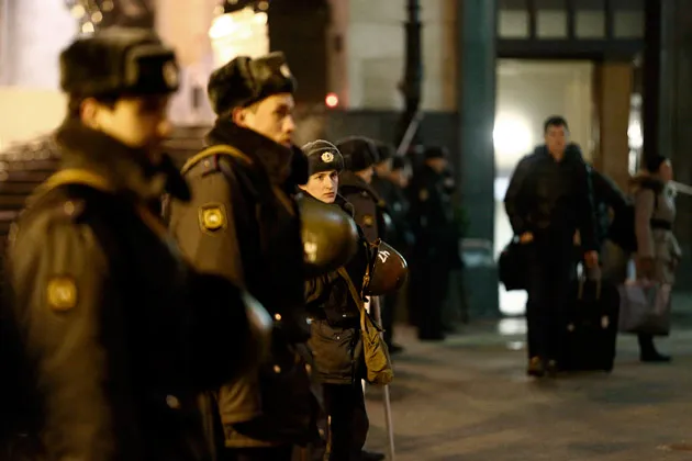 Police officers guard the Volgograd main railway station on Dec. 30