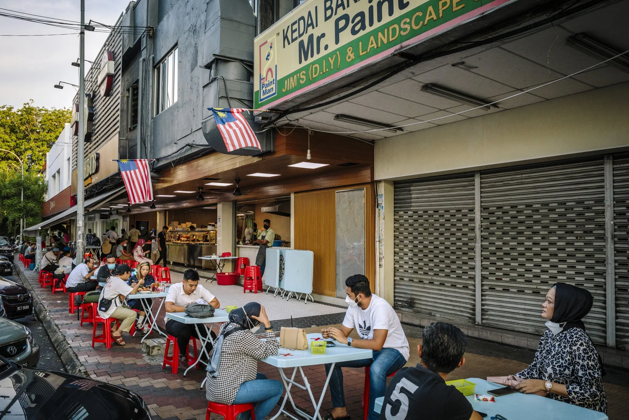 Customers dine outdoors at a restaurant in the Bangsar district of Kuala Lumpur in September.&nbsp;