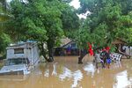 Residents of Leogane, Haiti find higher ground as the water level rose on Oct. 26, 2012. 