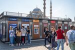 Customers use ATMs&nbsp;at a kiosk in the Beyazit district of Istanbul, Turkey.