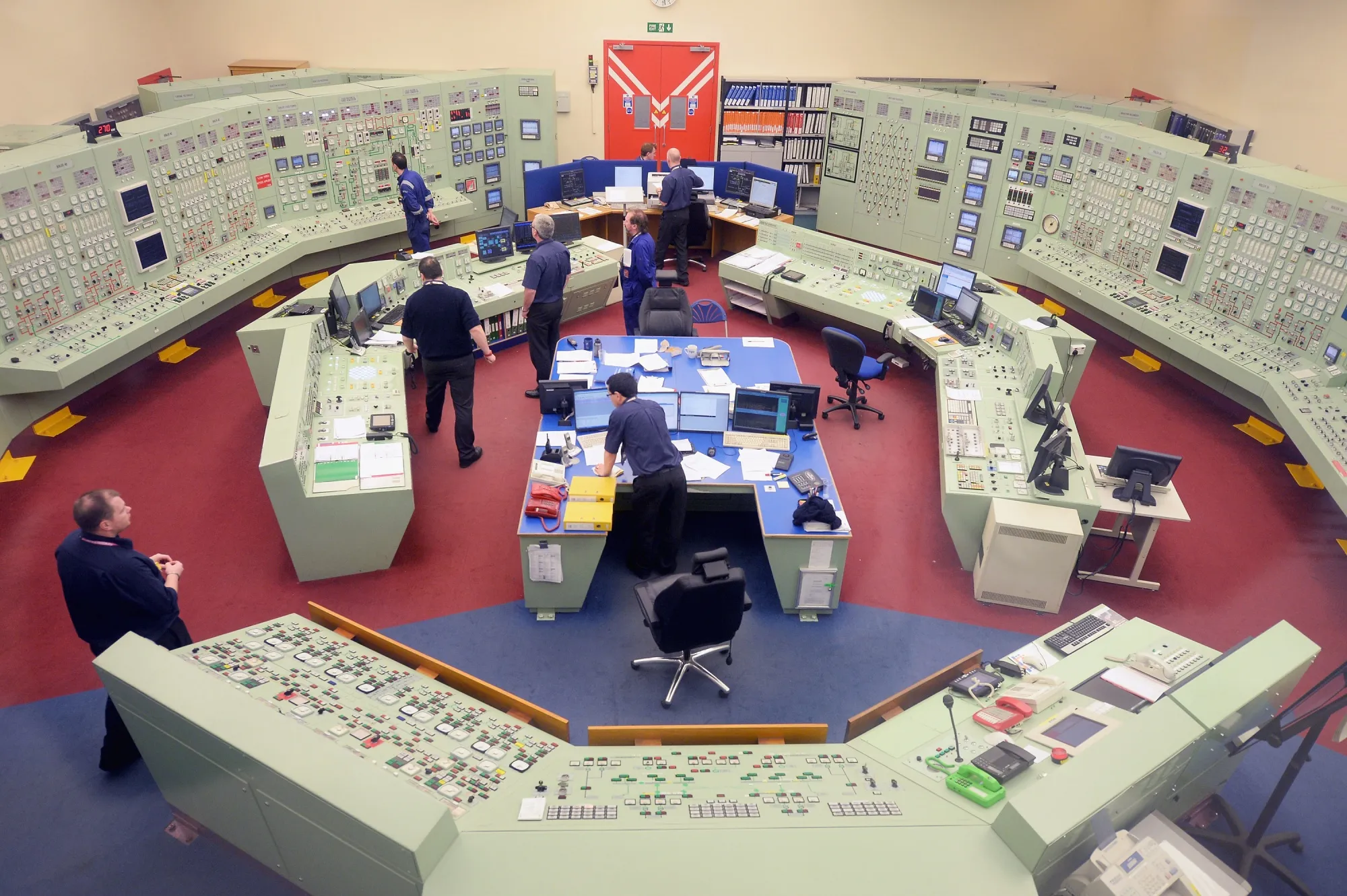 Workers at Hunterston B power station monitor the control room in West Kilbride, U.K.