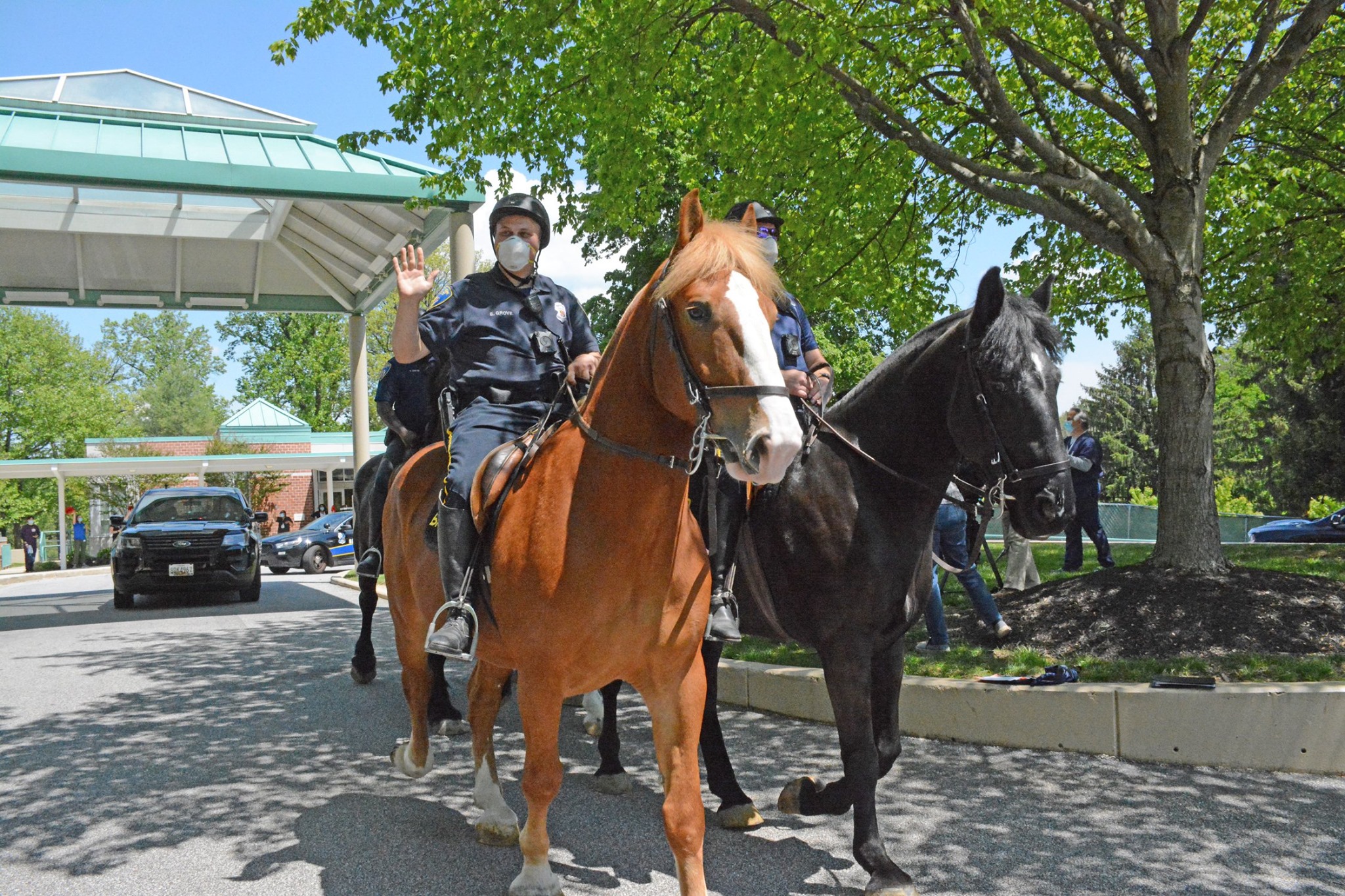 Baltimore’s mounted police unit appears at a parade honoring healthcare workers in May. &nbsp;