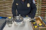 A U.S. Customs and Border Protection agricultural specialist examines blueberries from&nbsp;Mexico.