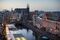 Flower stalls, left, float illuminated on a canal at the Bloemenmarkt as the Kalverton retail mall stands on the opposite bank in Amsterdam, Netherlands, on Thursday, Jan. 2, 2014. The Netherlands will grow by 0.5 percent in 2014 as the world economy improves and consumer confidence picks up, the country's central bank forecast Dec. 9. Photographer: Jasper Juinen/Bloomberg