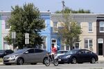 Zack Barber, 12, rides his bicycle in the Sandtown section of Baltimore.