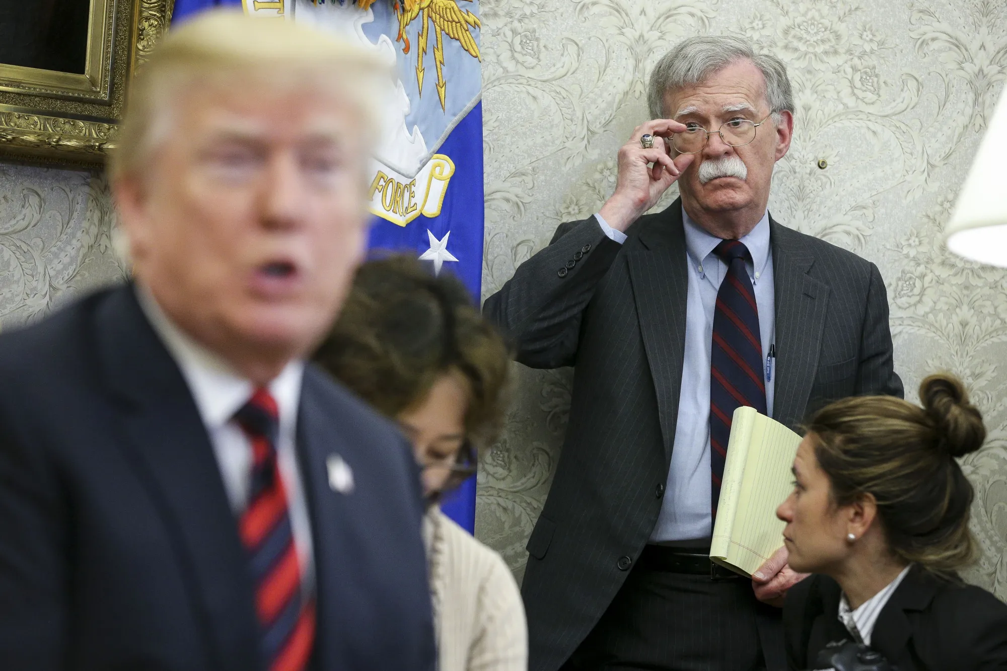 John Bolton attends a meeting in&nbsp;the Oval Office of the White House with then-President Donald Trump&nbsp;in 2018.