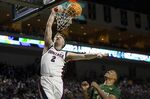 Gonzaga forward Drew Timme (2) shoots against San Francisco forward Patrick Tape (11) during the first half of an NCAA semifinal college basketball game at the West Coast Conference tournament Monday, March 7, 2022, in Las Vegas. (AP Photo/Ellen Schmidt)