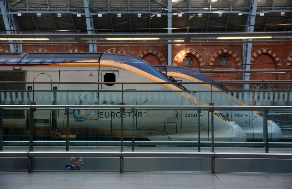 Eurostar trains on the platform at London St Pancras Station.
