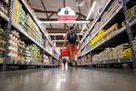 Shoppers browse items at a grocery store in San Francisco.