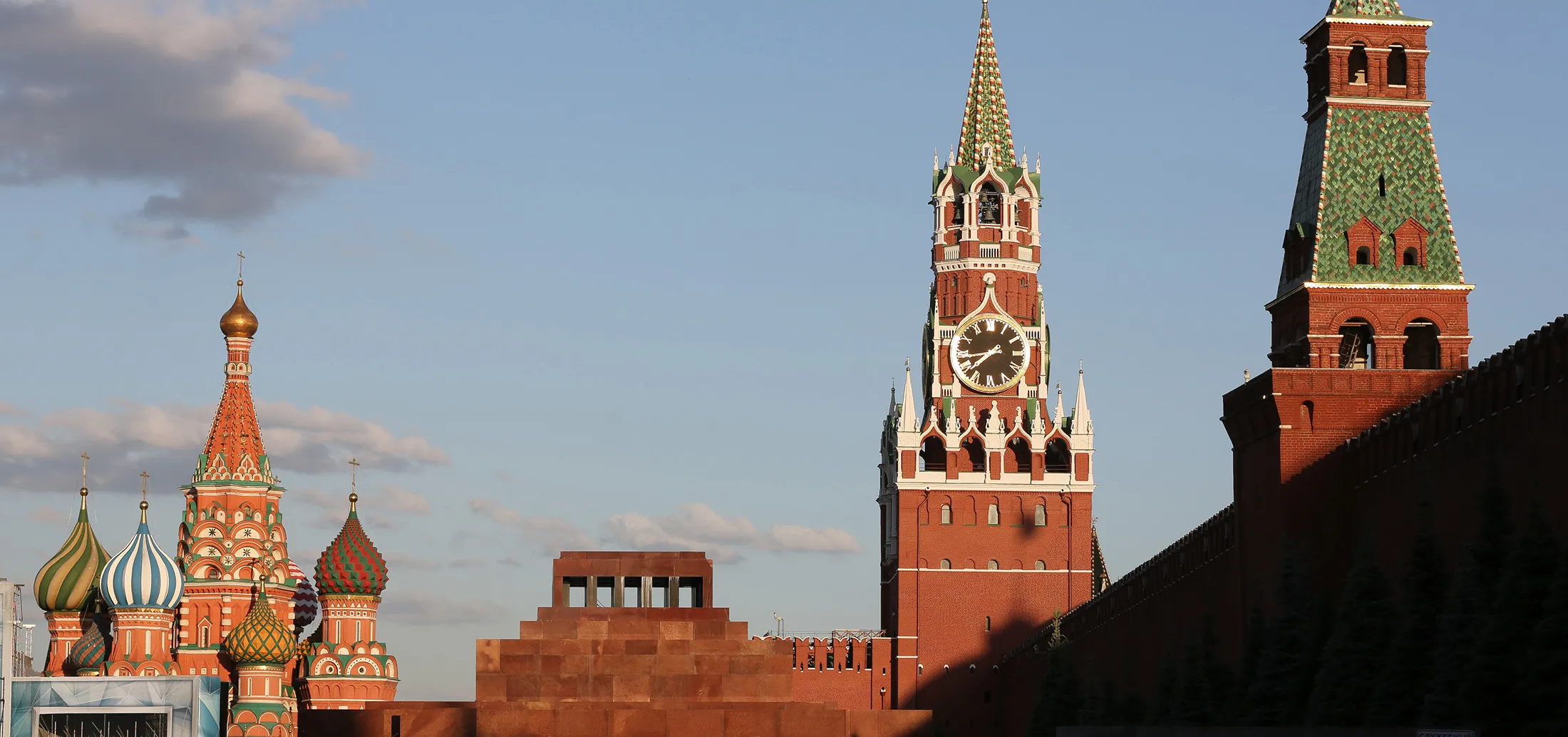 Lenins's mausoleum, center, stands on Red Square near the Kremlin, right, and St Basil's cathedral, left, on Red Square in Moscow.
