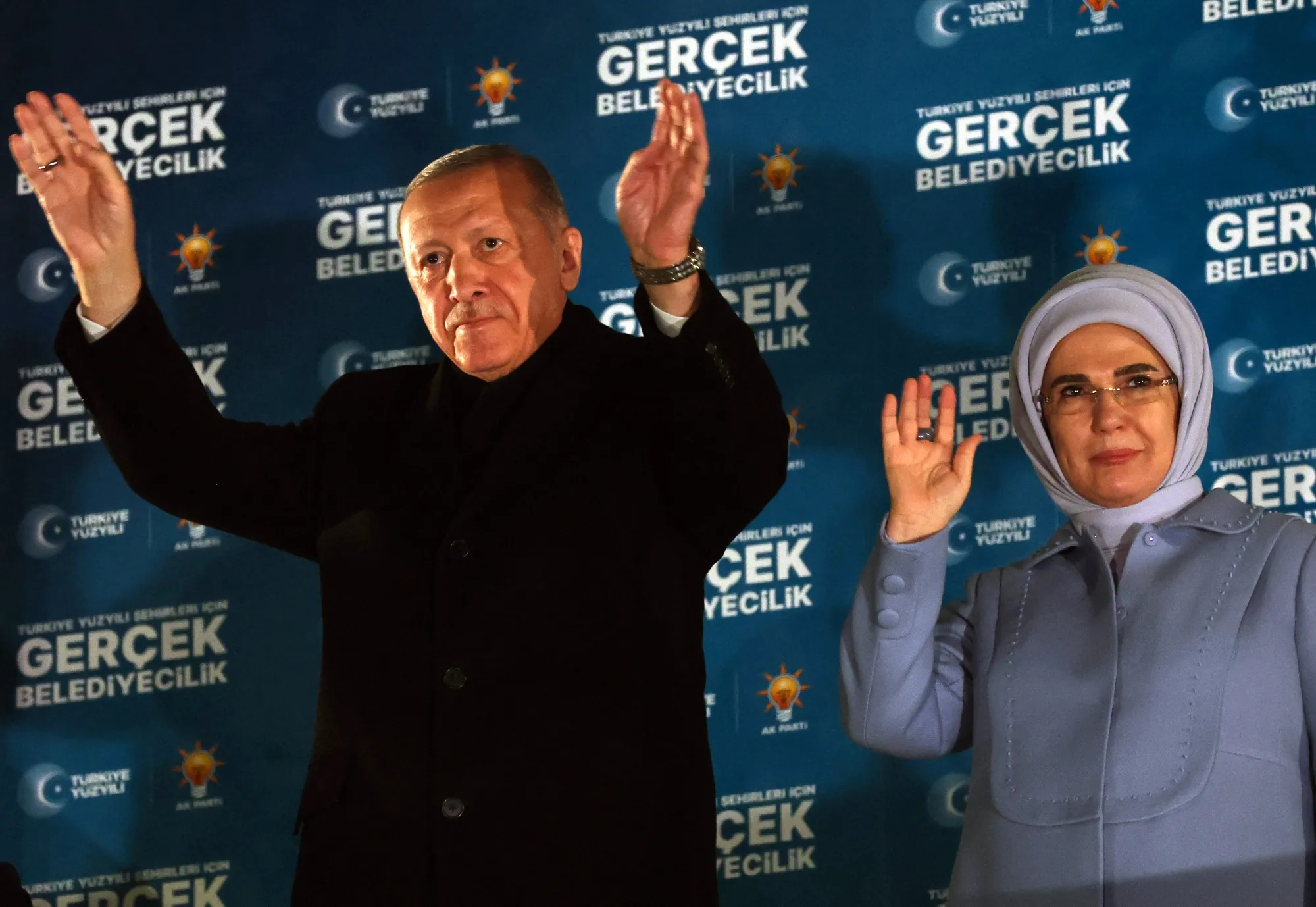 Turkish President and leader of Justice and Development (AK) Party Recep Tayyip Erdogan with his wife Emine Erdogan.