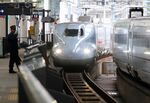 Kyushu Shinkansen bullet train approaches to Kumamoto Station.