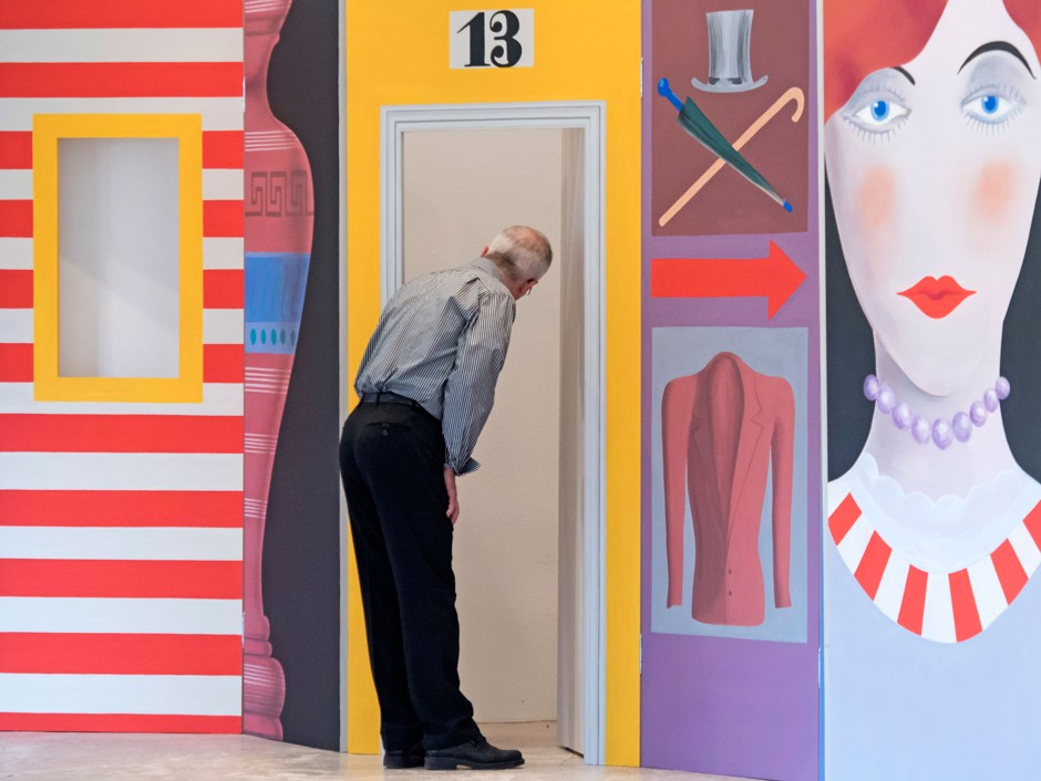 A visitor looks in to a replica of a stage backround for &quot;Olga-Olga&quot; during the 2016 exhibition &quot;Xanti Schawinsky - From the Bauhaus into the World&quot; in Magdeburg, Germany.