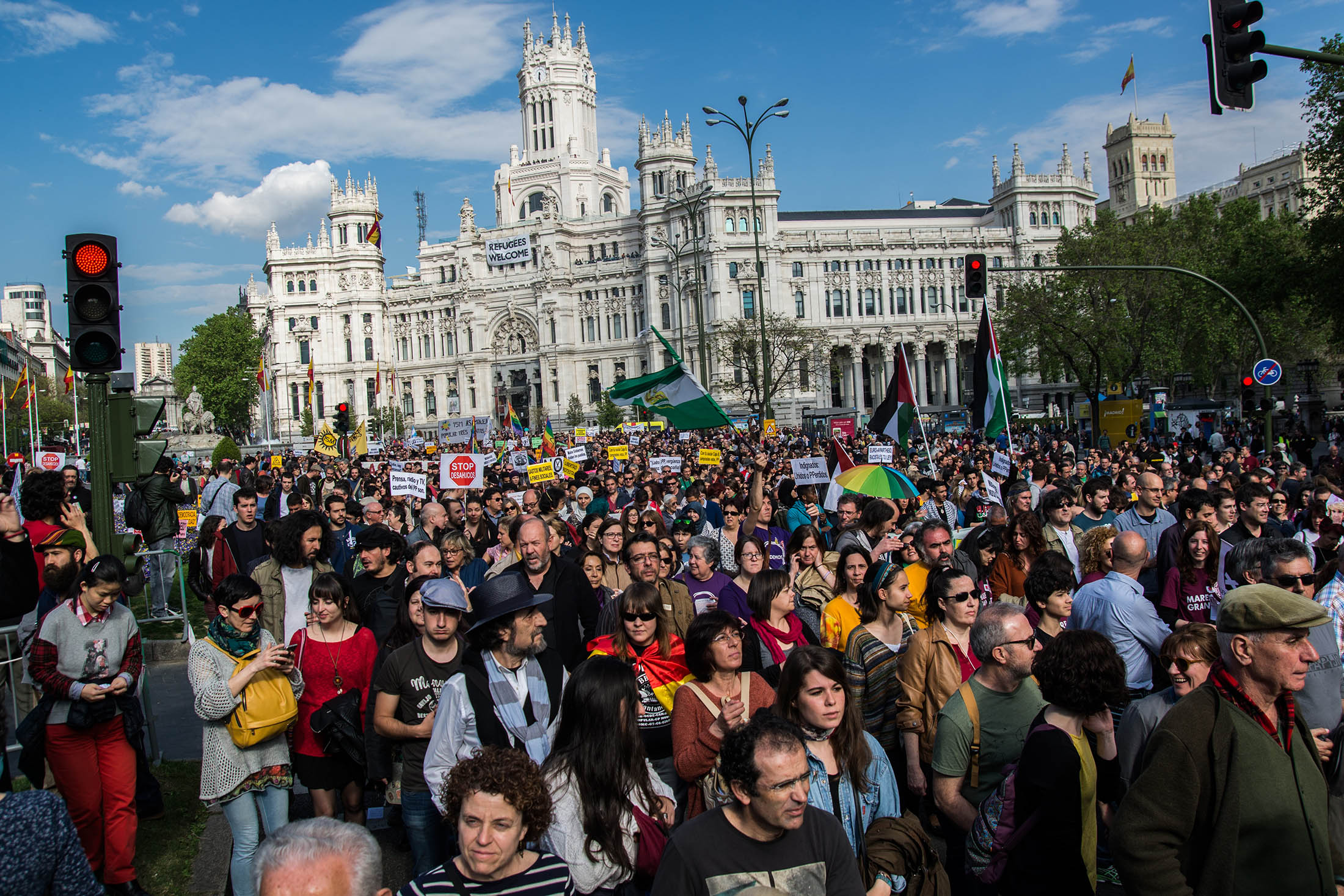 People protest on the streets during the fifth anniversary of 15M movement on May 15. EU commissioners meet Wednesday to discuss taking action after Acting Prime Minister Mariano Rajoy breached his country’s budget limit for a fourth successive year.
