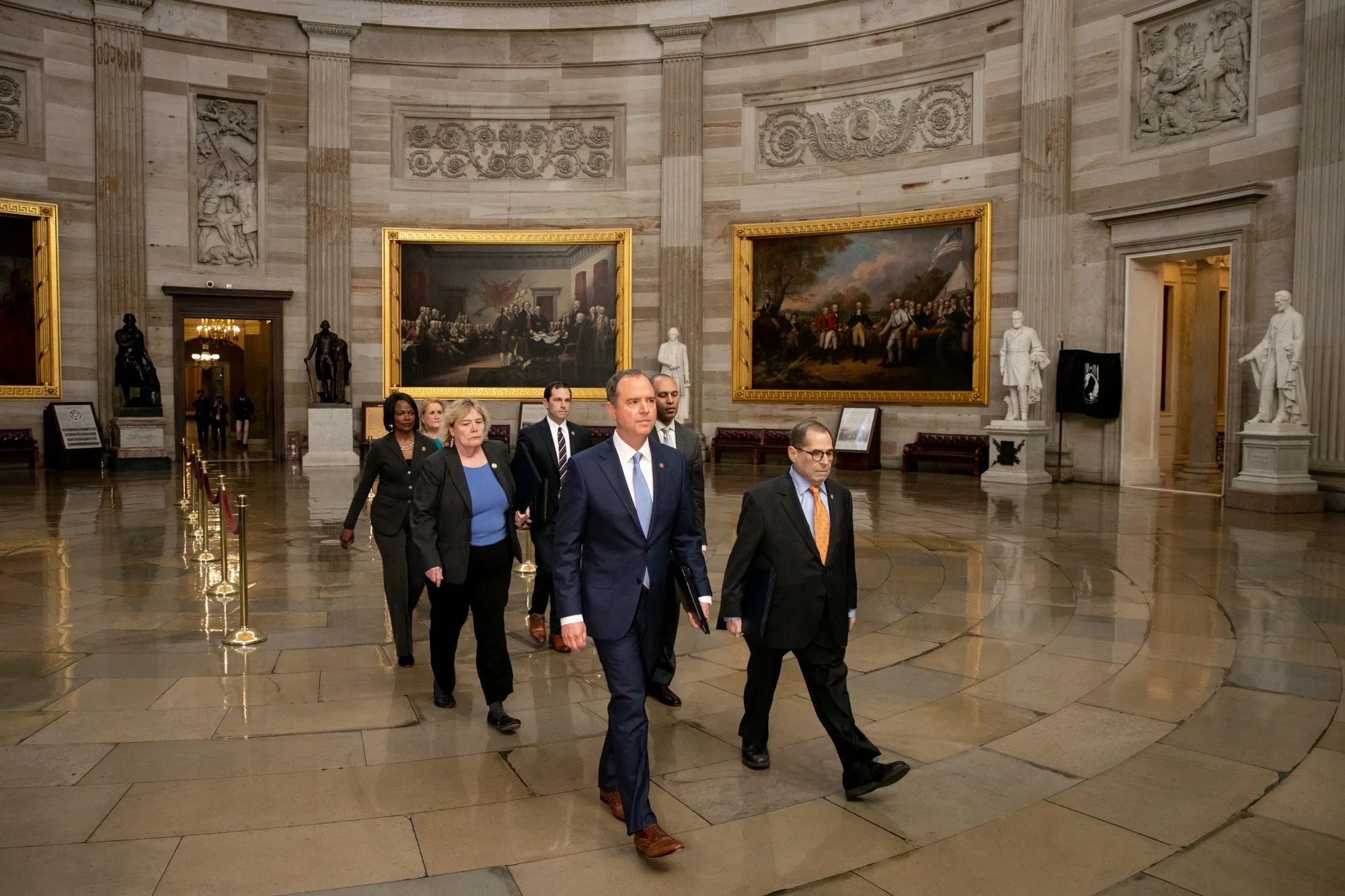 House impeachment managers including Representative Adam Schiff, a Democrat from California, center, and Representative Jerry Nadler, a Democrat from New York, right, walk to the Senate floor for impeachment proceedings&nbsp;in Washington, D.C. on Jan. 16.