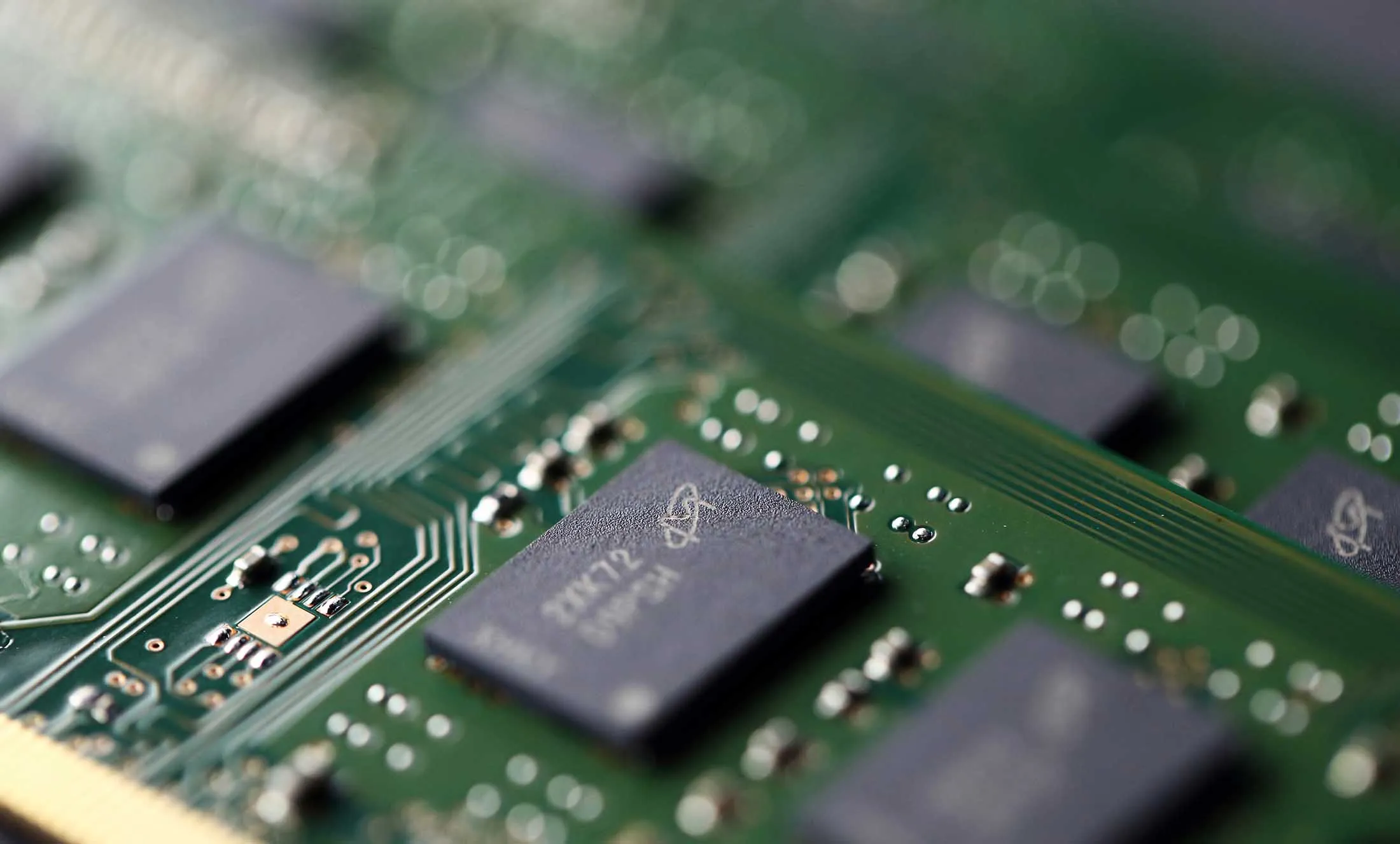 Micron Technology Inc. Double-Data-Rate Synchronous Random-Access Memory (SDRAM) chips are arranged for a photograph in Tokyo, Japan, on Wednesday, July 15, 2015.

