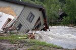 A house that was pulled into Rock Creek by floodwaters in Red Lodge, Montana,&nbsp;on June 14.