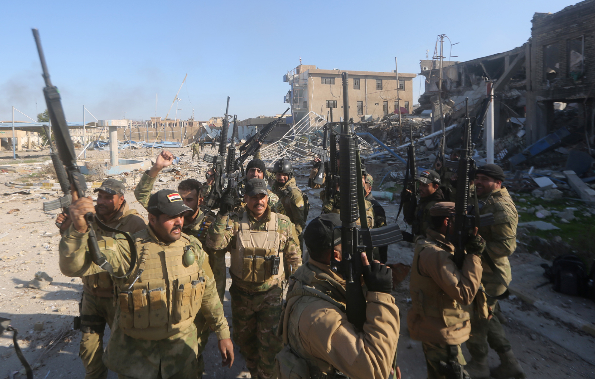 Iraqi security forces after recapturing Ramadi. Photographer: Ahmad Al-Rubaye/AFP/Getty Images
