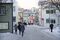 Pedestrians walk along a snow covered street in the shopping district of central Reykjavik, Iceland, on Thursday, Jan. 14, 2016. Iceland's prime minister expects hedge funds to pay their "fair share" as the country prepares to dismantle the final barriers to free capital flows. Photographer: Arnaldur Halldorsson/Bloomberg