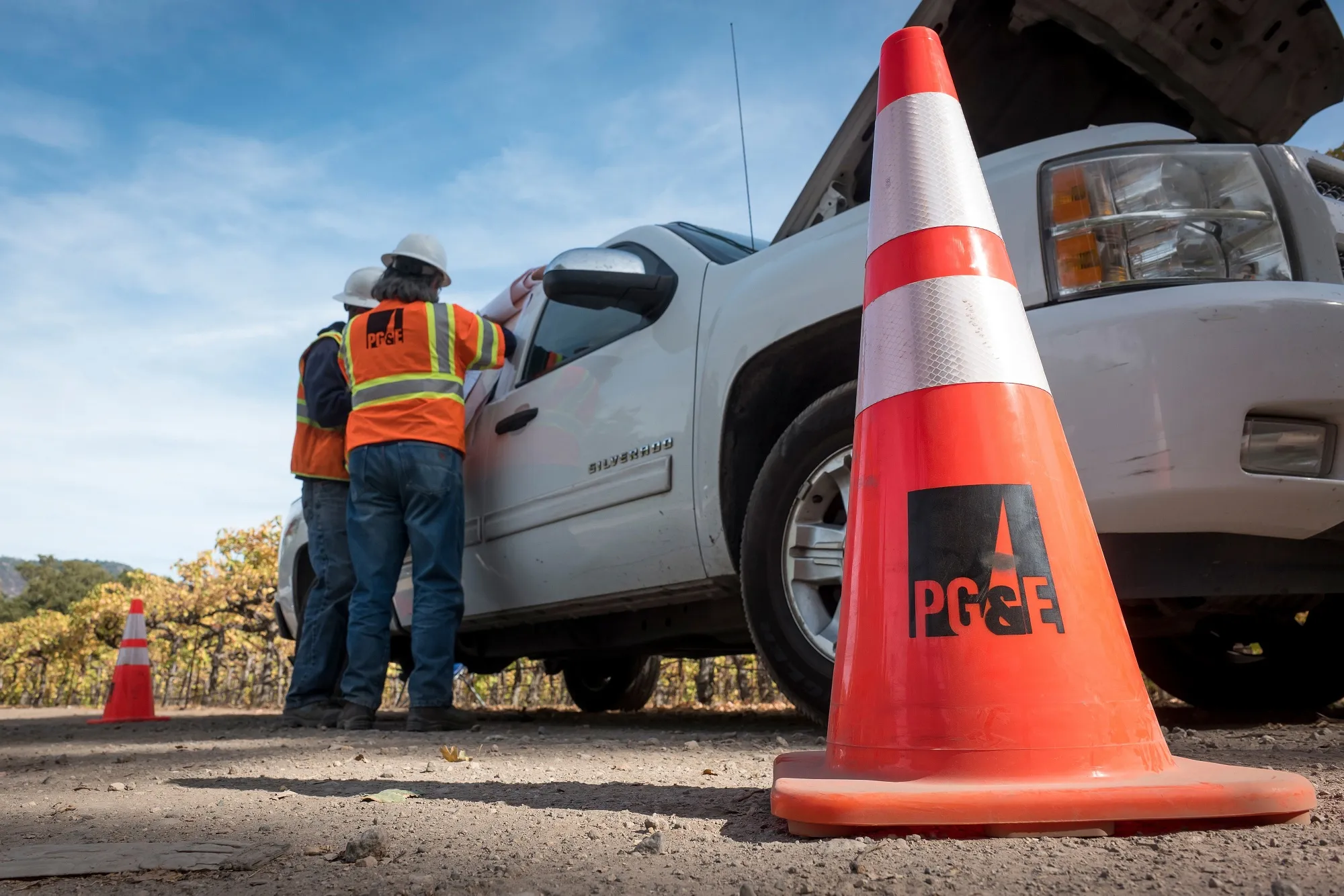 PG&amp;E Corp. workers prepare to energize power lines in Calistoga, California.