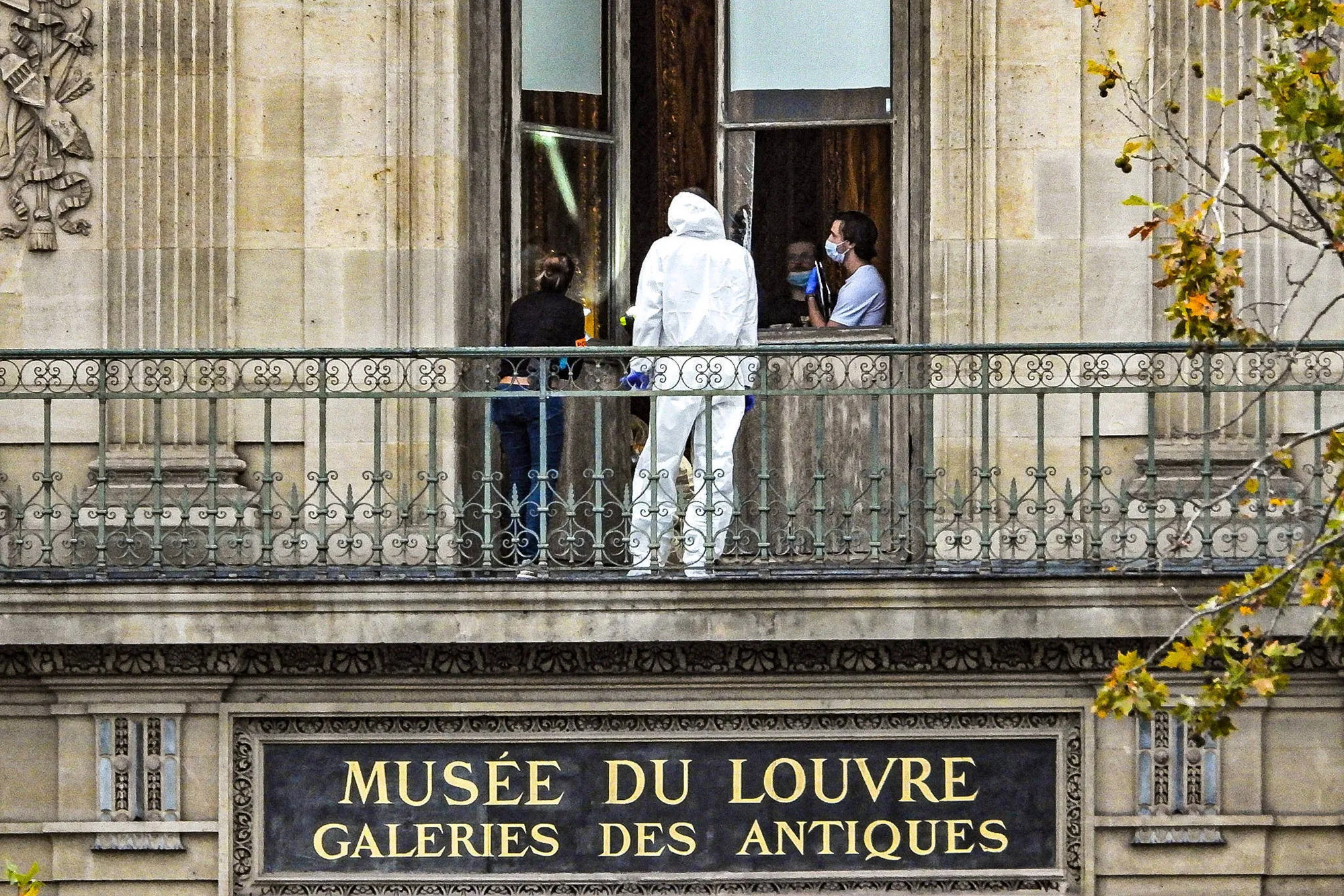 Forensic investigators at the Louvre Museum on Oct. 20.
